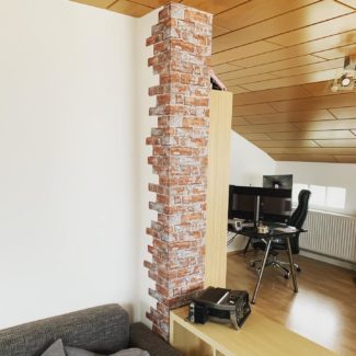 Gestaltung eines Kaminvorsprunges mit Steintapete 